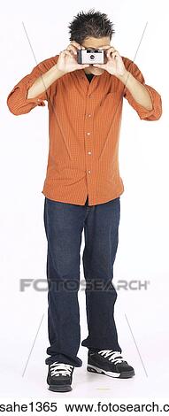 Stock Photography - young man with orange shirt . Fotosearch