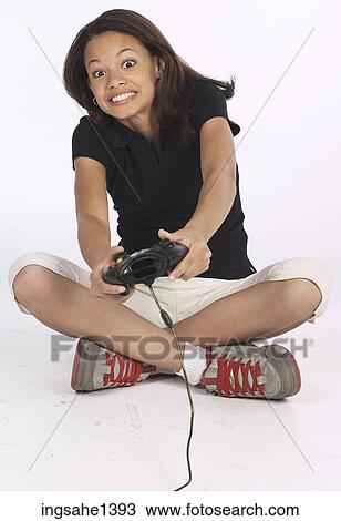 Stock Image - young woman in black shirt . Fotosearch