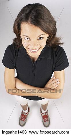 Stock Image - young woman in black shirt . Fotosearch