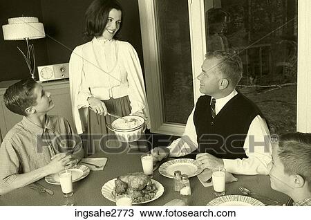 1950s family at dinner table View Large Photo Image Stock Image - 1950s family at dinner table . Fotosearch