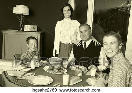 1950s family at dinner table View Large Photo Image Stock Photo - 1950s family at dinner table . Fotosearch