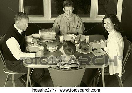 1950s family at dinner table View Large Photo Image Stock Photo - 1950s family at dinner table . Fotosearch