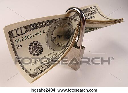 Picture - American money in lock . Fotosearch