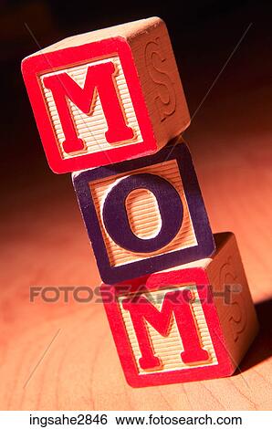 Stock Photograph - Blocks spelling out the word mom . Fotosearch