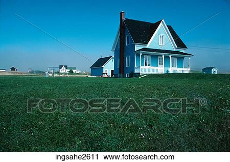 Blue house on in green field View Large Photo Image Stock Image - Blue house on in green field . Fotosearch