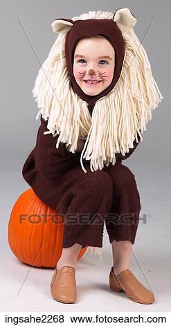 Stock Photo - Child dressed as lion . Fotosearch