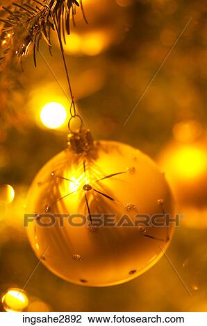 Stock Image - Christmas decorations on tree . Fotosearch