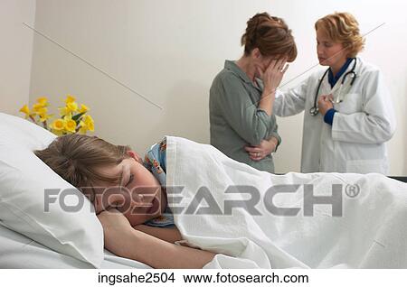 Picture - Doctor comforting patient's mother an 2. Fotosearch