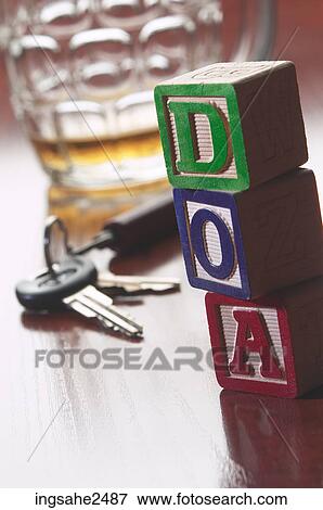 Empty beer mug and car keys with DOA blocks an 1 View Large Photo Image Stock Photo - Empty beer mug and car keys with DOA blocks an 1. Fotosearch