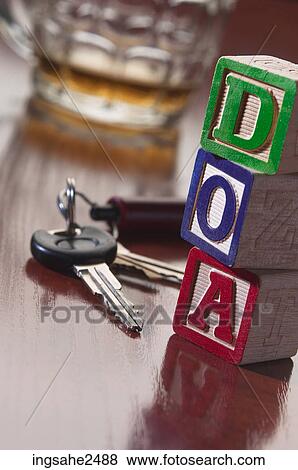 Empty beer mug and car keys with DOA blocks an 2 View Large Photo Image Stock Photo - Empty beer mug and car keys with DOA blocks an 2. Fotosearch