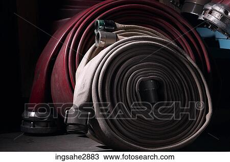 Fire hoses View Large Photo Image Stock Image - Fire hoses . Fotosearch