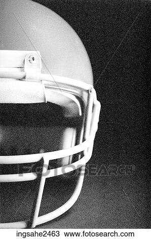 Stock Image - Half-shot of football helmet . Fotosearch