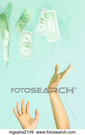 Stock Photo - hands grabbing money BE 2. Fotosearch