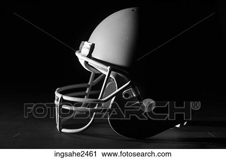 Lone football helmet with shadow View Large Photo Image Stock Image - Lone football helmet with shadow . Fotosearch
