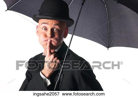 Man in tuxedo with top hat & Umbrella BE 7 View Large Photo Image Stock Photo - Man in tuxedo with top hat & Umbrella BE 7. Fotosearch