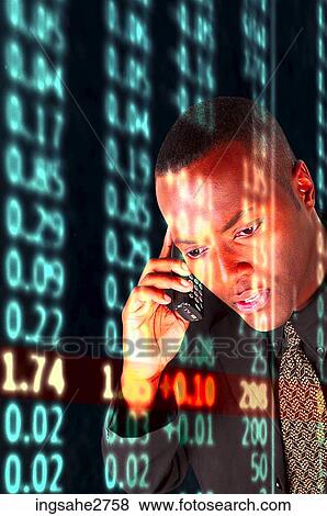 Stock Photo - man on cell phone and stock quotes . Fotosearch