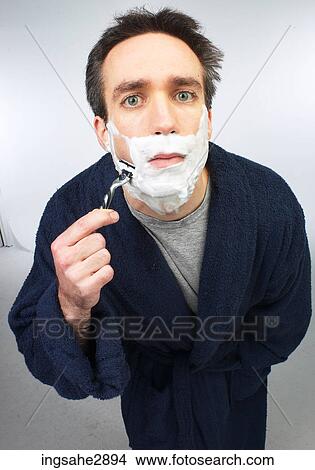 man shaving face View Large Photo Image Picture - man shaving face . Fotosearch