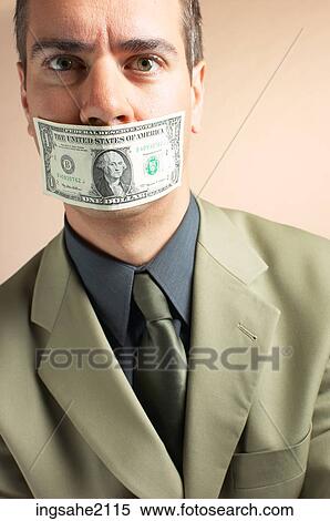 Stock Photography - man with money over mouth BE 3. Fotosearch