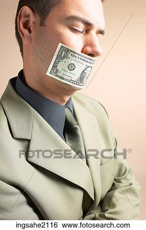 man with money over mouth BE 4 View Large Photo Image Stock Photograph - man with money over mouth BE 4. Fotosearch