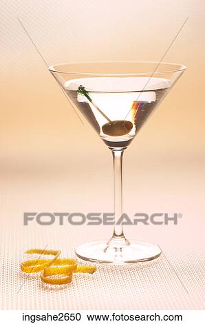 Martini with olive and twist an 1 View Large Photo Image Stock Image - Martini with olive and twist an 1. Fotosearch