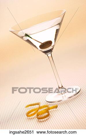 Martini with olive and twist an 2 View Large Photo Image Stock Image - Martini with olive and twist an 2. Fotosearch