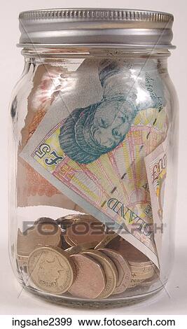 Stock Photo - Money in glass jar . Fotosearch