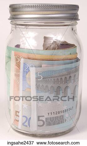 Money in glass jar View Large Photo Image Stock Photo - Money in glass jar . Fotosearch
