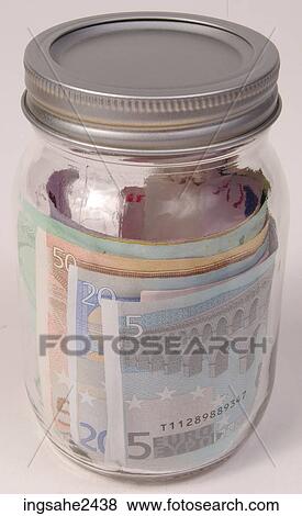 Money in glass jar View Large Photo Image Stock Photo - Money in glass jar . Fotosearch