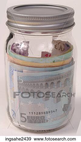 Money in glass jar View Large Photo Image Stock Photo - Money in glass jar . Fotosearch