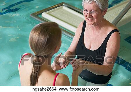 Patient undergoing water rehabilitation therapy an 6 View Large Photo Image Picture - Patient undergoing water rehabilitation therapy an 6. Fotosearch