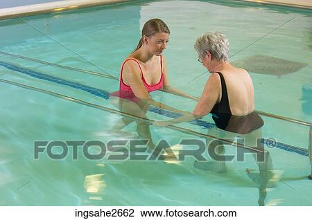 Stock Image - Patient undergoing water rehabilitation therapy an 3. Fotosearch