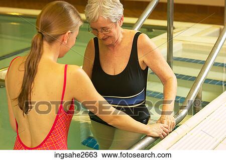 Stock Image - Patient undergoing water rehabilitation therapy an 4. Fotosearch