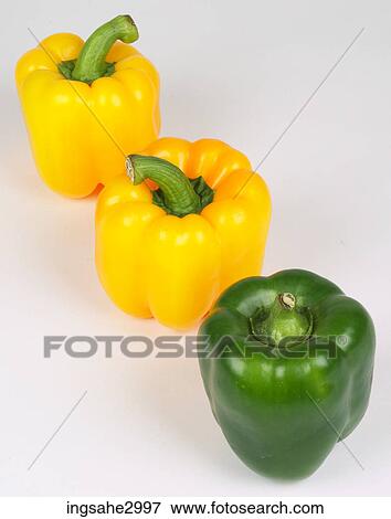 peppers in a row View Large Photo Image Stock Photo - peppers in a row . Fotosearch