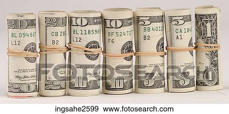 Stock Photo - Rolls of American bills . Fotosearch
