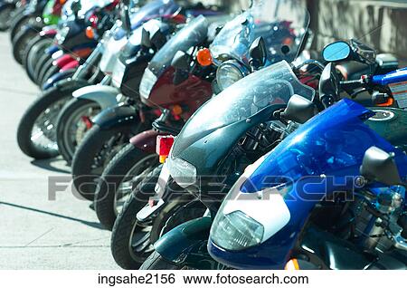 Row of motorbikes View Large Photo Image Stock Photograph - Row of motorbikes. Fotosearch