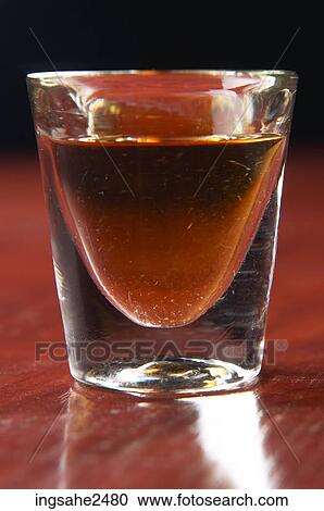 Shot glass of liquor an 2 View Large Photo Image Stock Image - Shot glass of liquor an 2. Fotosearch