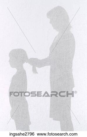 Stock Photograph - Silhouette of woman and child . Fotosearch