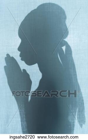 Stock Image - Silhouette of woman . Fotosearch