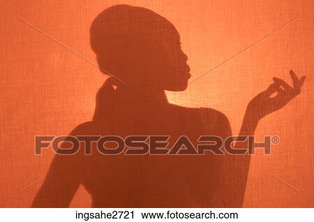 Stock Image - Silhouette of woman . Fotosearch