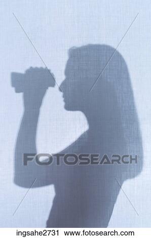 Stock Image - Silhouette of woman . Fotosearch