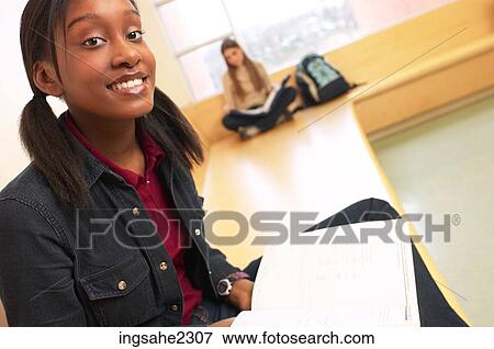 Stock Photo - Smiling student a81. Fotosearch