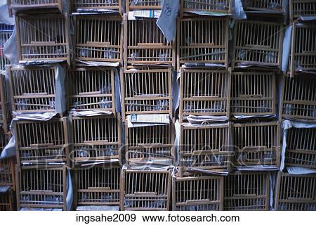 Stock Photo - stack of bird cages. Fotosearch