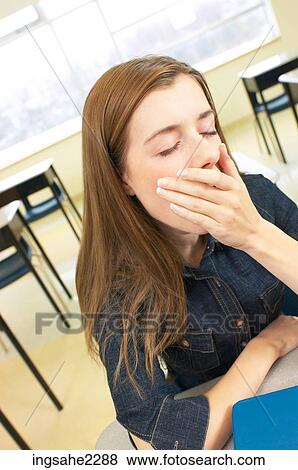 Student sitting at desk a86 View Large Photo Image Stock Photo - Student sitting at desk a86. Fotosearch