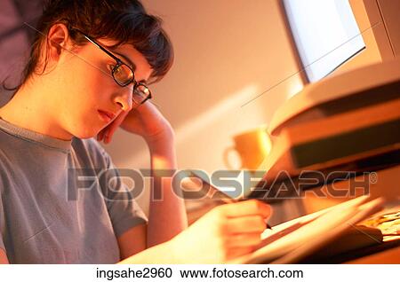 Student studying at desk View Large Photo Image Stock Image - Student studying at desk . Fotosearch