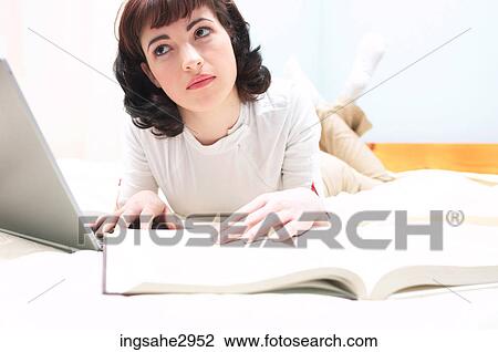 Student studying with laptop View Large Photo Image Stock Image - Student studying with laptop . Fotosearch