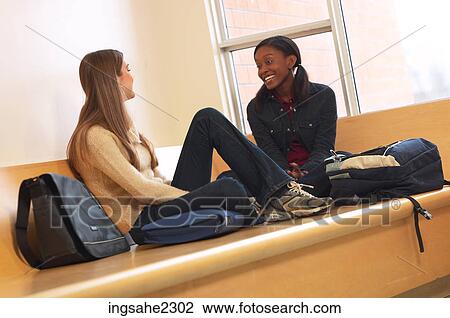Students hanging out at school View Large Photo Image Stock Image - Students hanging out at school. Fotosearch