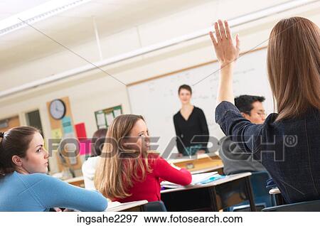 Teacher in classroom full of students a83 View Large Photo Image Stock Photo - Teacher in classroom full of students a83. Fotosearch