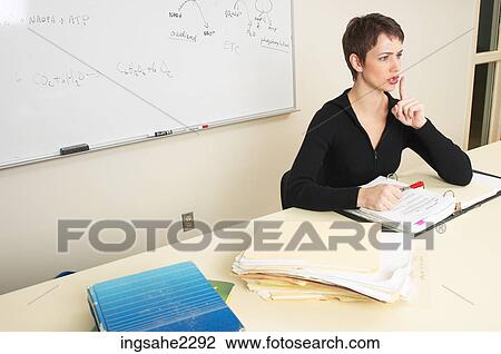Teacher silencing students View Large Photo Image Stock Image - Teacher silencing students. Fotosearch