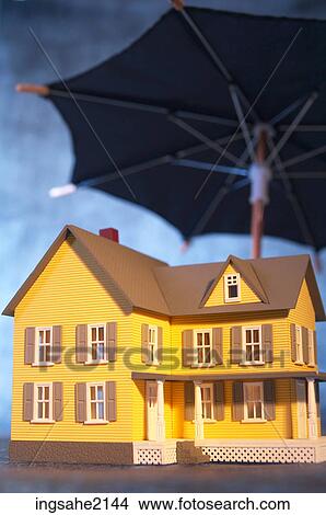 Toy house & Umbrella BE View Large Photo Image Picture - Toy house & Umbrella BE. Fotosearch