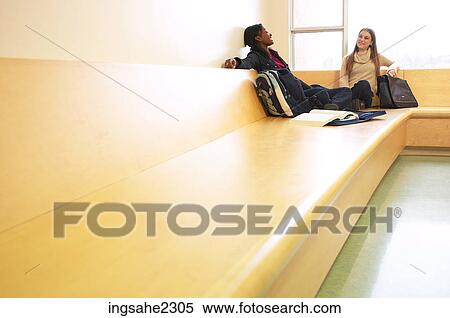 Two girls studying a84 View Large Photo Image Stock Photography - Two girls studying a84. Fotosearch